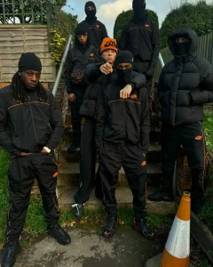 Syna World Shell Tracksuit [BLACK/ORANGE] - Image 2