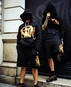 Syna World Short Black Orange - Image 2